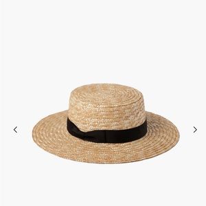 Lack of color boater hat. Straw